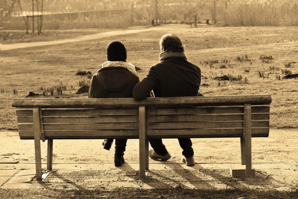 People talking on bench