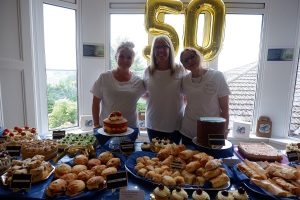 Housekeeping team with their bakes for the Broadway Lodge bake sale